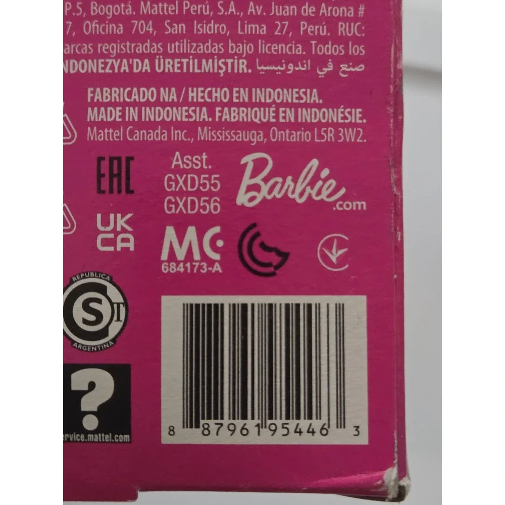 Barbie unwrap magic